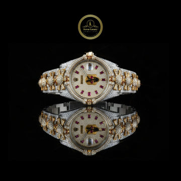 Exquisite Gold and Silver Diamond-Studded Luxury Watch with Pink Baguette Markers, Artistic Dial, and Bow-Link Bracelet Design